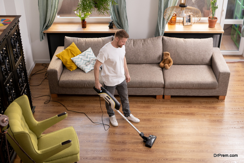 young-man-cleaning-Floor